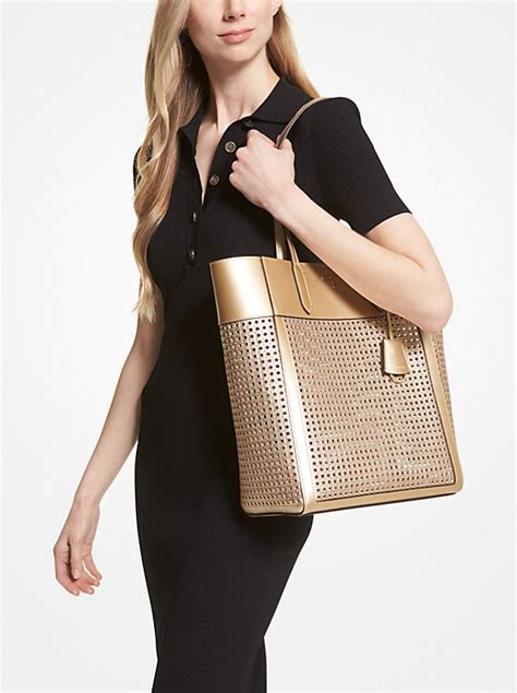 michael michael kors sinclair large perforated leather tote bag|Michael Kors clear crossbody bag.